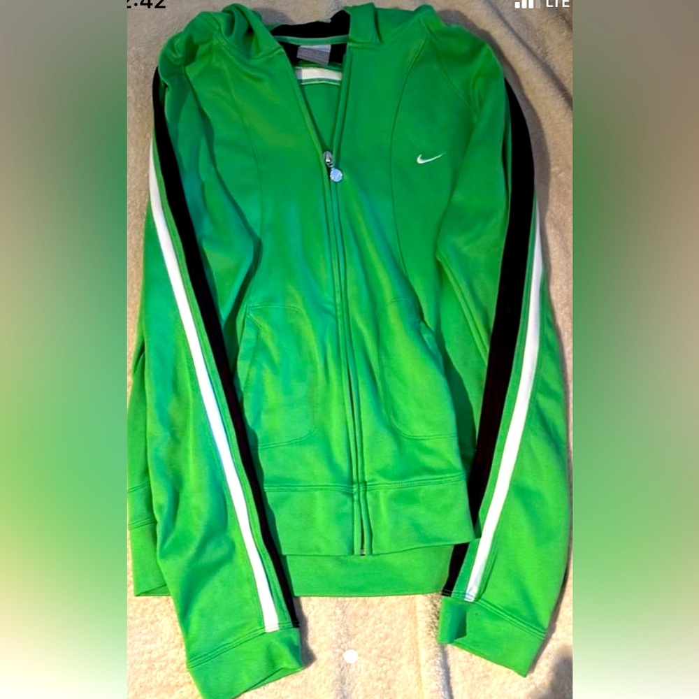 Nike zip up fitted  size large, one small snag but not noticeable